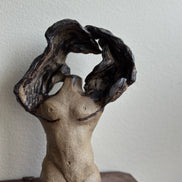 Winged torso