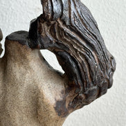 Winged torso